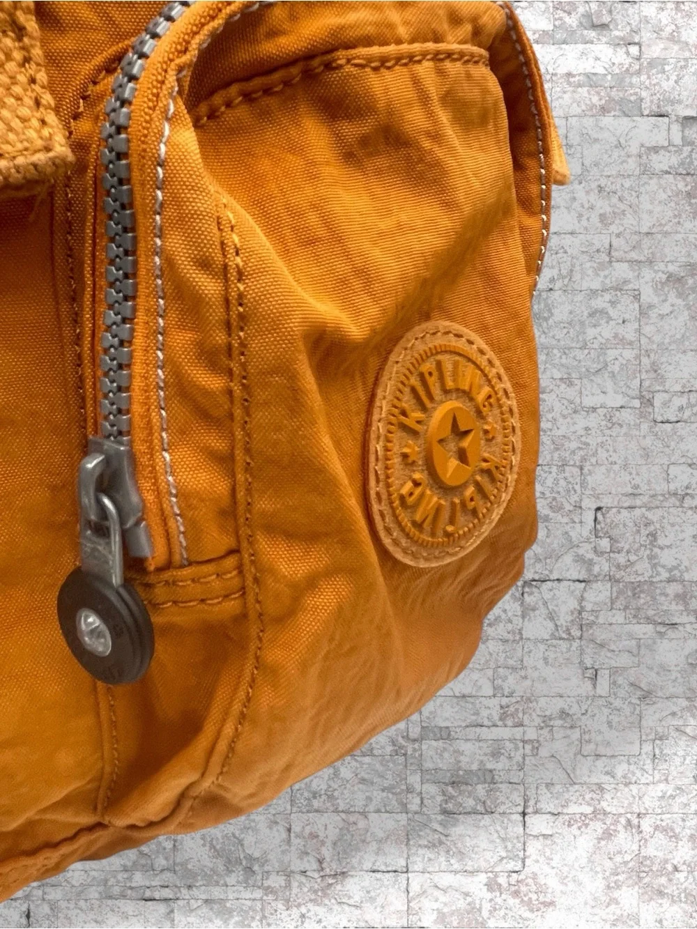 Kipling Vintage Crinkle Nylon Cargo Drawstring Mini Backpack – Orange